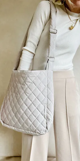 B. Young Quilted Crossbody Bag