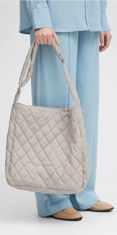 B. Young Quilted Crossbody Bag